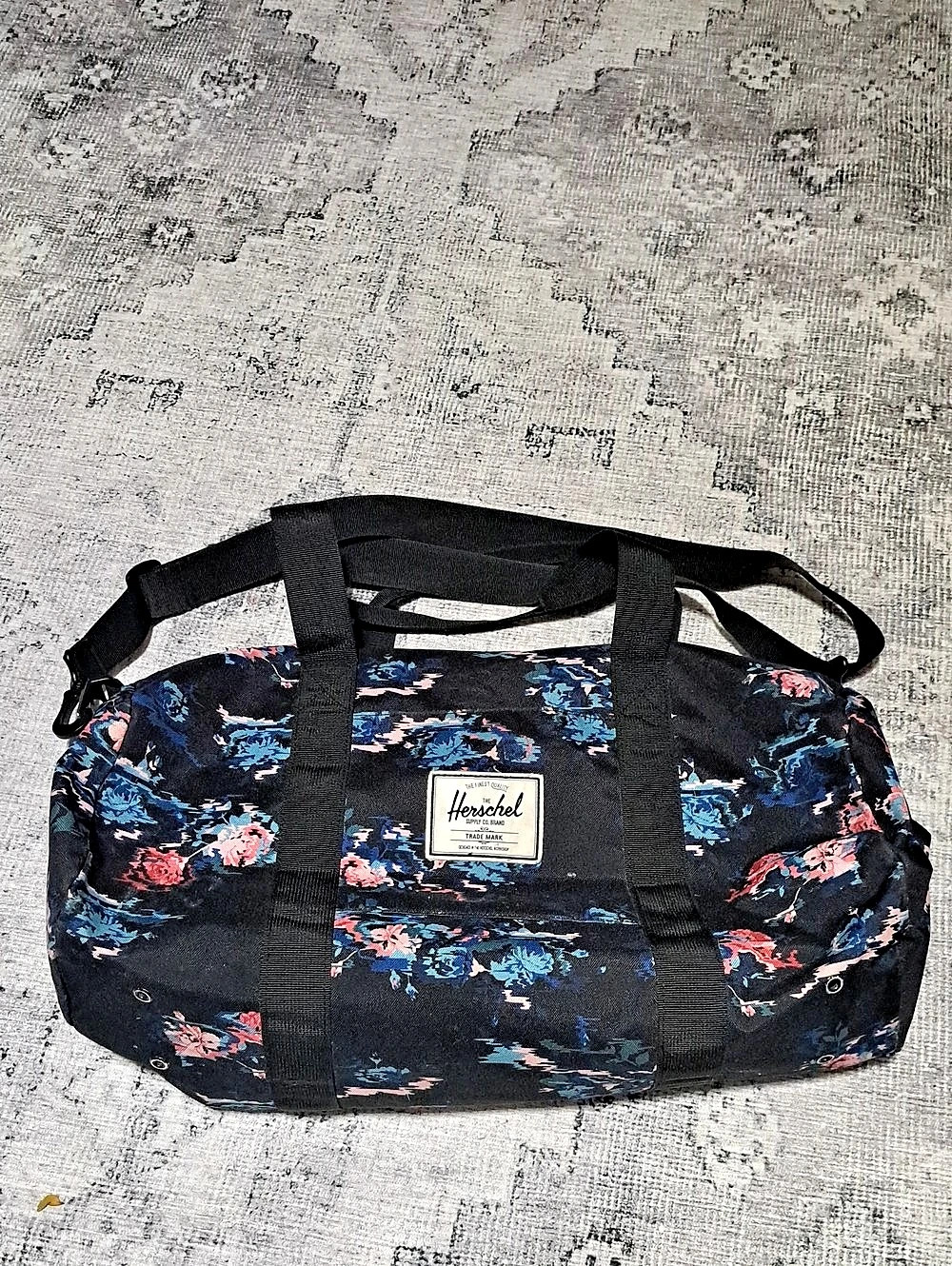 Herschel Floral Travel Duffel in Black & Blue